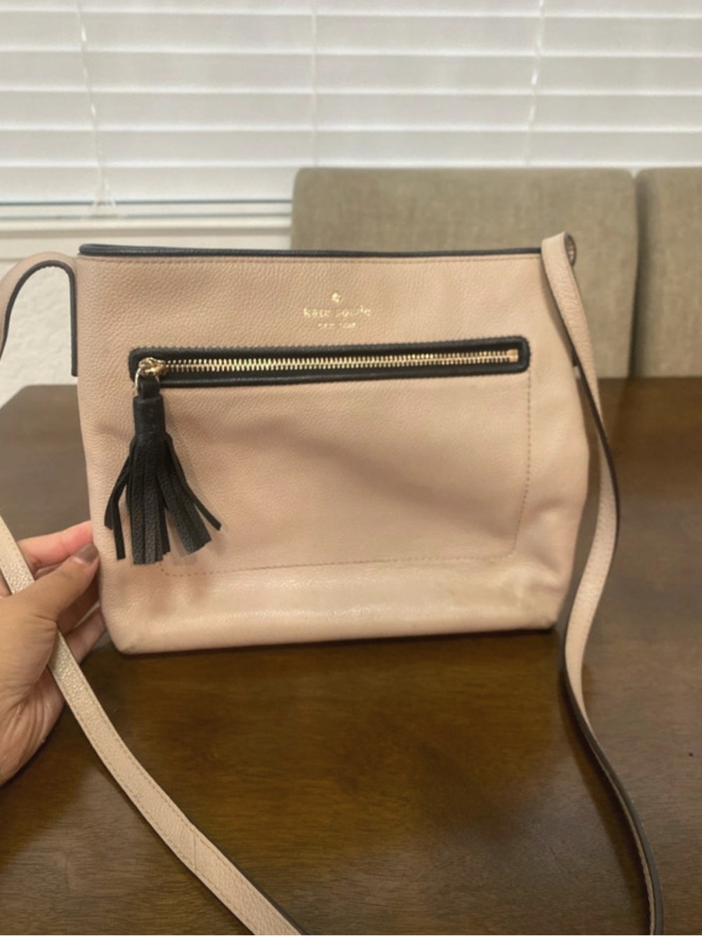 kate spade cream leather crossbody with black tassel